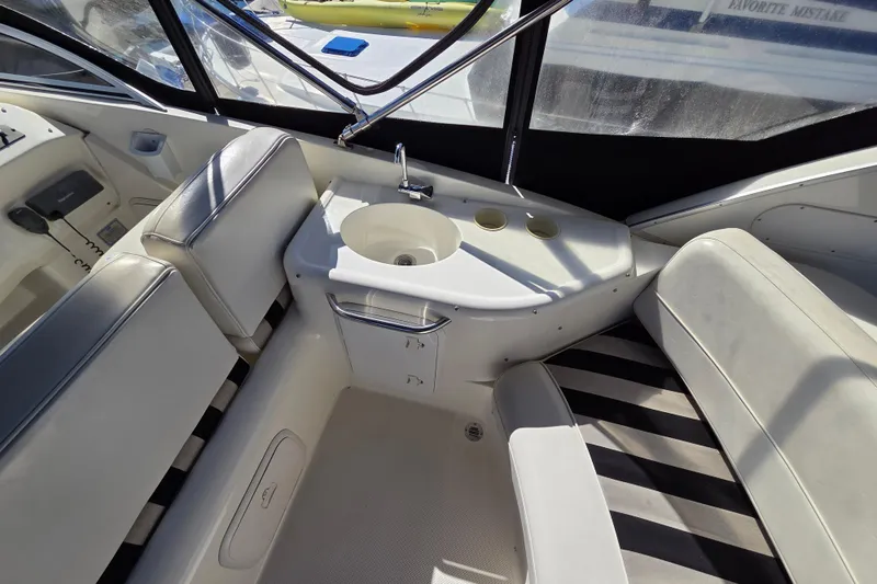 Soul Mates Yacht Photos Pics 2005 Meridian 411 Sedan interior with seating and sink area.