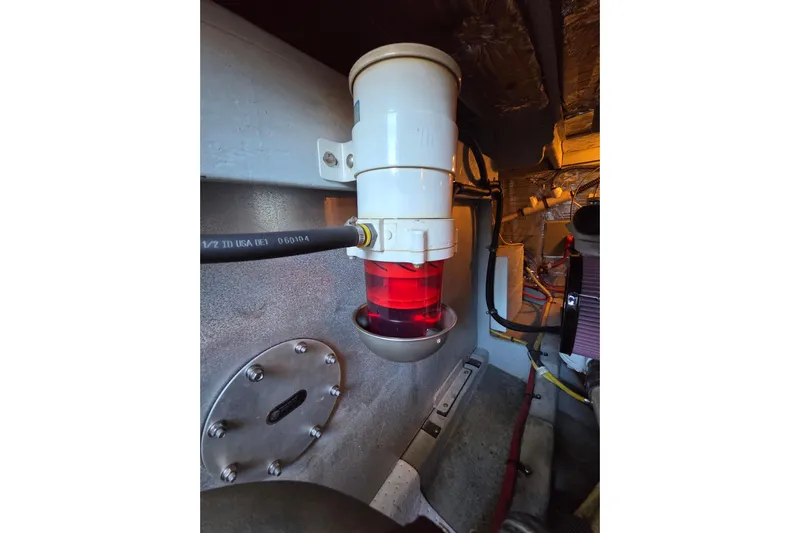 Soul Mates Yacht Photos Pics Engine room of 2005 Meridian 411 Sedan with visible fuel filter system.