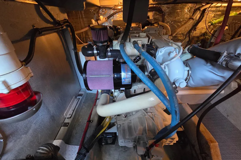 Soul Mates Yacht Photos Pics Engine room of a 2005 Meridian 411 Sedan with visible components and wiring.