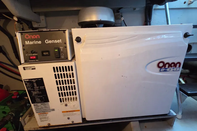 Soul Mates Yacht Photos Pics Onan marine generator in a 2005 Meridian 411 Sedan yacht engine room.