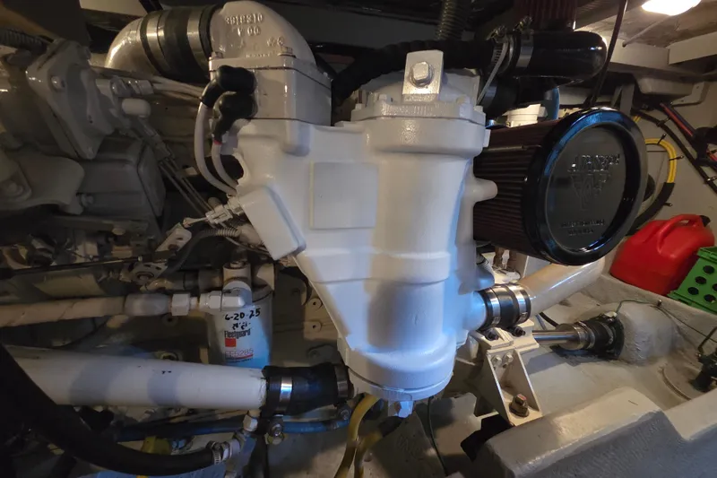 Soul Mates Yacht Photos Pics Engine room of a 2005 Meridian 411 Sedan yacht, showcasing mechanical components.