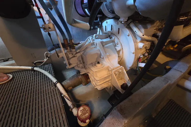 Soul Mates Yacht Photos Pics Engine room of a 2005 Meridian 411 Sedan boat, showcasing mechanical components.