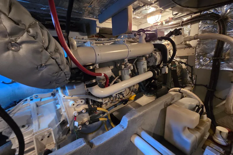 Soul Mates Yacht Photos Pics Engine room of a 2005 Meridian 411 Sedan yacht, showcasing mechanical components.