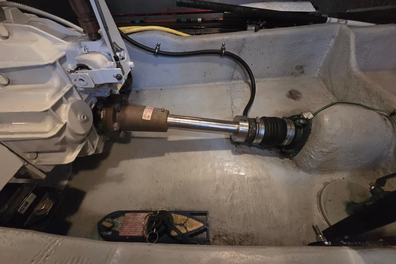 Soul Mates Yacht Photos Pics Engine compartment of a 2005 Meridian 411 Sedan boat, showing mechanical components.