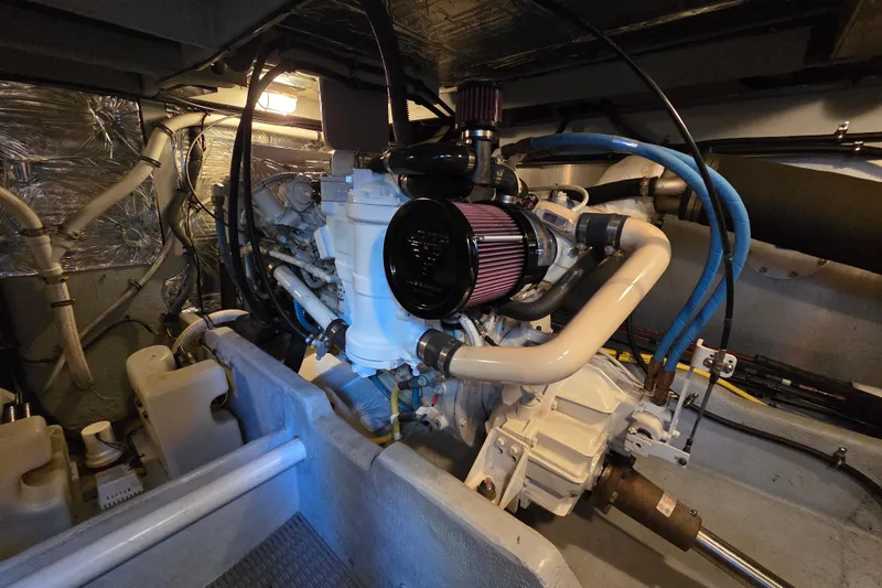 Soul Mates Yacht Photos Pics Engine room of a 2005 Meridian 411 Sedan with visible components and wiring.