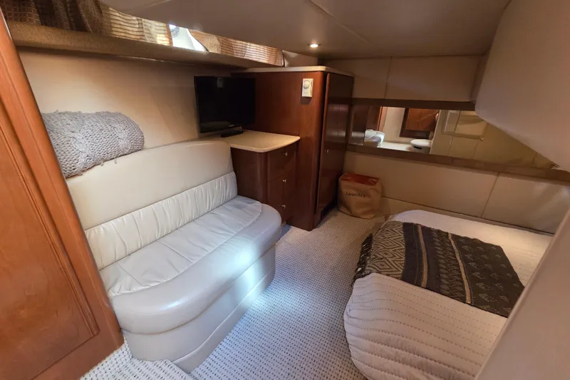 Soul Mates Yacht Photos Pics Luxurious interior of 2005 Meridian 411 Sedan yacht with cozy seating and elegant decor.