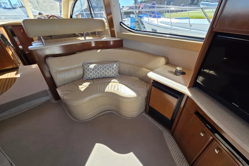 Soul Mates Yacht Photos Pics Luxurious interior of 2005 Meridian 411 Sedan yacht with leather seating and modern amenities.