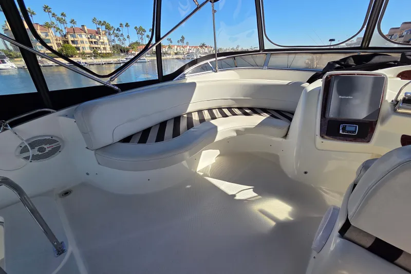 Soul Mates Yacht Photos Pics Interior of 2005 Meridian 411 Sedan yacht with seating and navigation equipment.