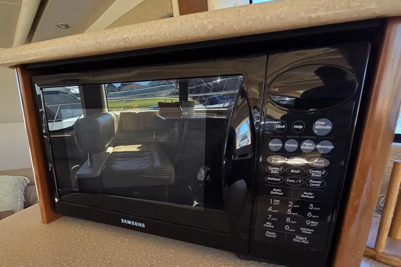 Soul Mates Yacht Photos Pics Samsung microwave inside 2005 Meridian 411 Sedan yacht kitchen area.