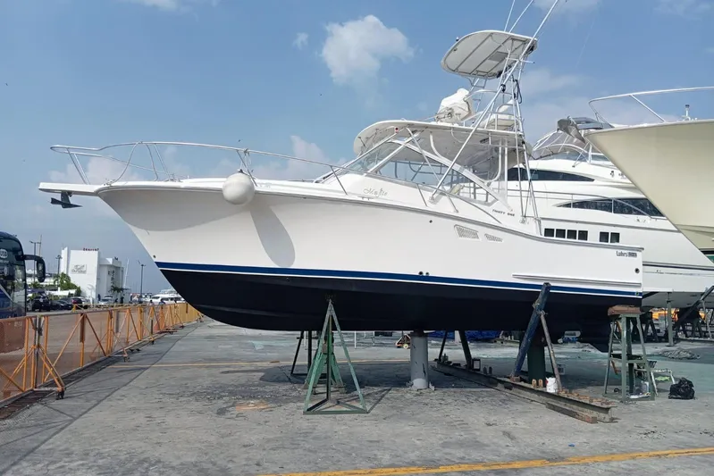  Yacht Photos Pics 2008 Luhrs 31 Hard Top IPS boat on dry dock, ready for maintenance.