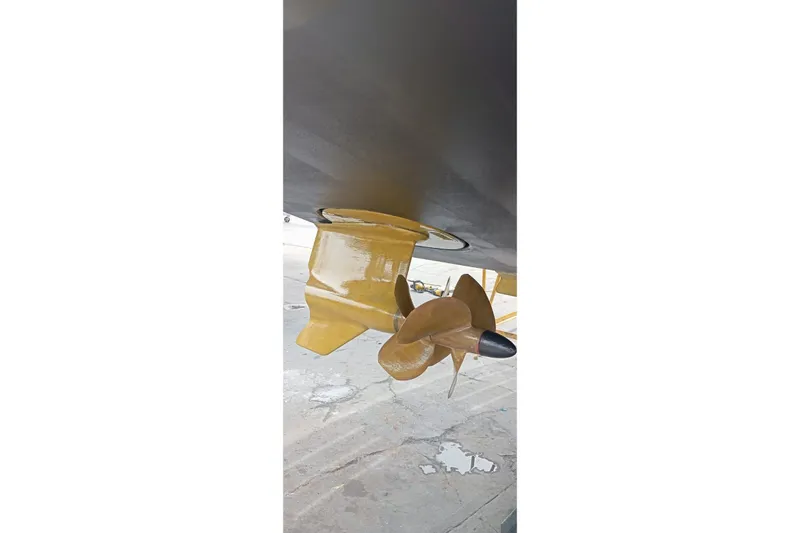  Yacht Photos Pics Propeller of 2008 Luhrs 31 Hard Top IPS boat, docked on concrete surface.