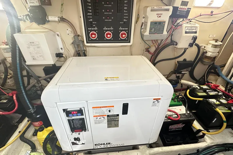  Yacht Photos Pics Engine room of 2008 Luhrs 31 Hard Top IPS with Kohler power system and batteries.