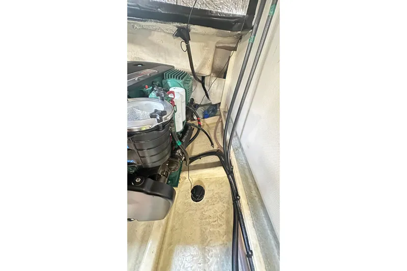  Yacht Photos Pics Engine compartment of 2008 Luhrs 31 Hard Top IPS boat, showcasing mechanical components.