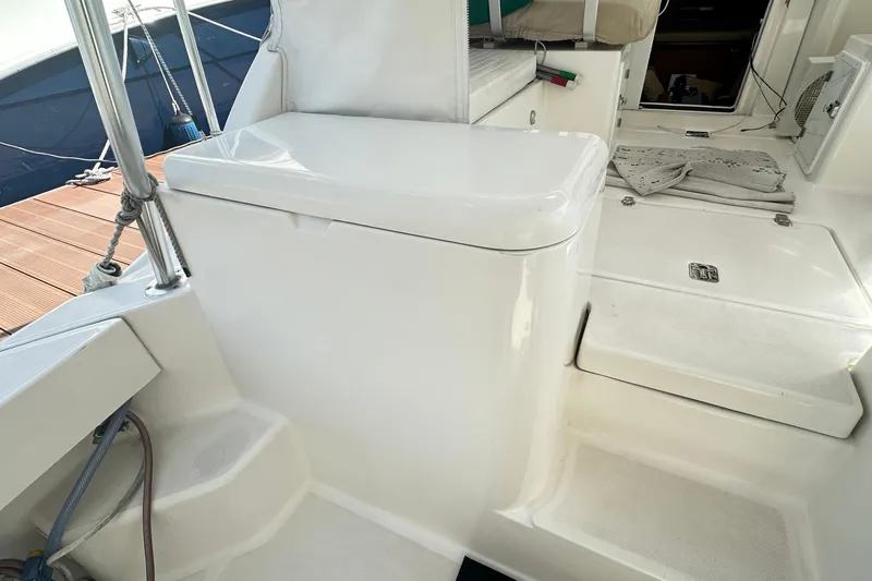  Yacht Photos Pics 2008 Luhrs 31 Hard Top IPS boat interior with white seating and storage area.