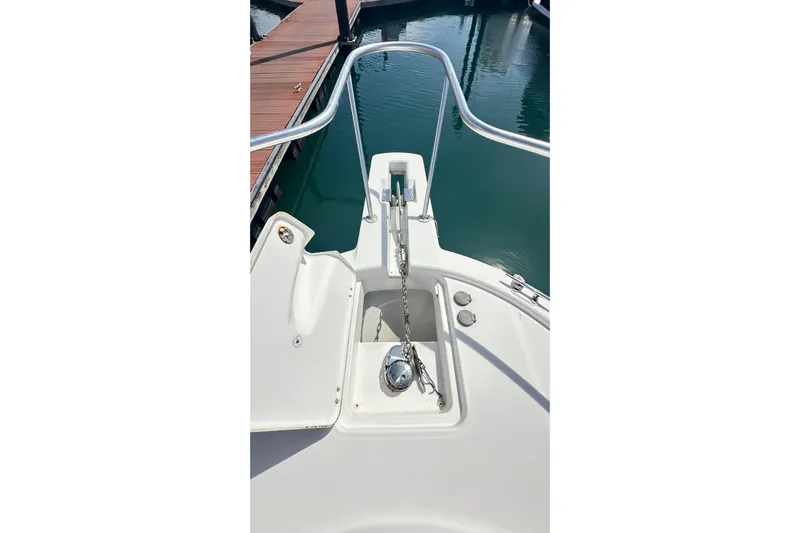  Yacht Photos Pics 2008 Luhrs 31 Hard Top IPS boat anchor and chain at marina dock.