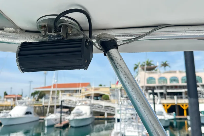  Yacht Photos Pics 2008 Luhrs 31 Hard Top IPS boat detail with marina background.