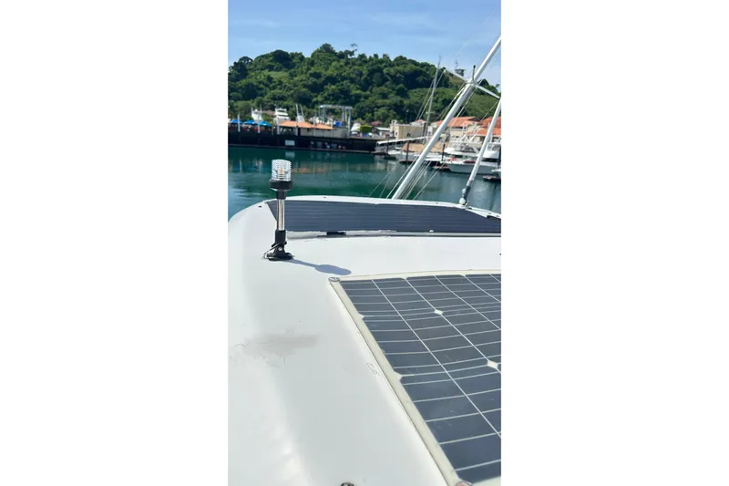  Yacht Photos Pics 2008 Luhrs 31 Hard Top IPS boat with solar panels docked in a marina.