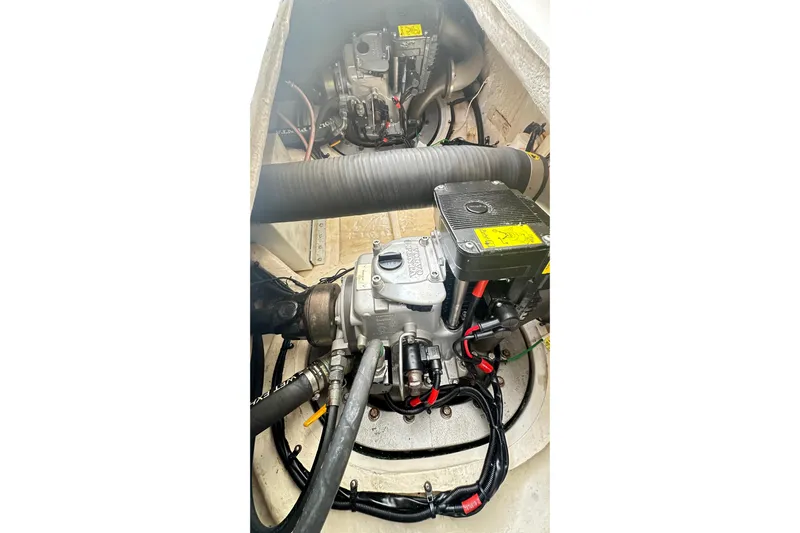  Yacht Photos Pics Engine compartment of 2008 Luhrs 31 Hard Top IPS boat, showcasing mechanical components.