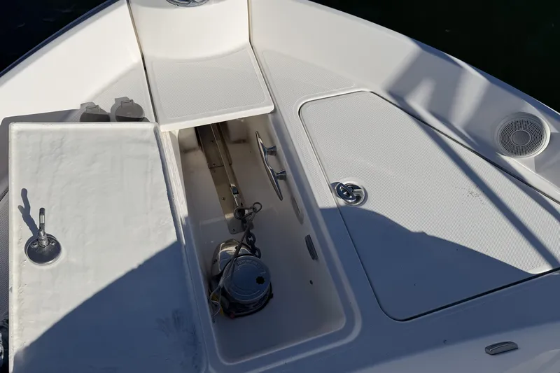 Dancing Queen Yacht Photos Pics 2019 Regal 42 Grande Coupe boat deck with storage compartments and speaker.