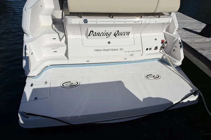 Dancing Queen Yacht Photos Pics 2019 Regal 42 Grande Coupe yacht stern, named "Dancing Queen," docked at Hilton Head Island.