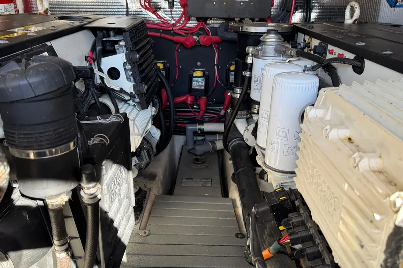 Dancing Queen Yacht Photos Pics Engine compartment of a 2019 Regal 42 Grande Coupe with visible components and wiring.