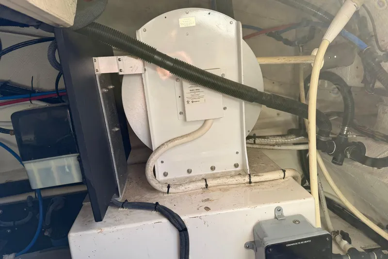 Dancing Queen Yacht Photos Pics Engine room of a 2019 Regal 42 Grande Coupe with visible wiring and components.