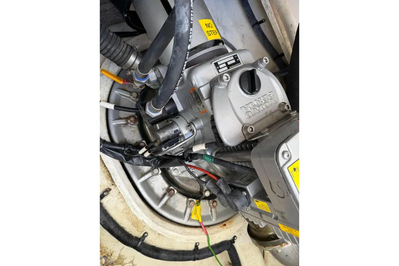 Dancing Queen Yacht Photos Pics Engine compartment of a 2019 Regal 42 Grande Coupe with Volvo Penta components.
