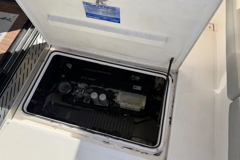 Dancing Queen Yacht Photos Pics Engine compartment of a 2019 Regal 42 Grande Coupe boat, featuring a Volvo Penta IPS 500.