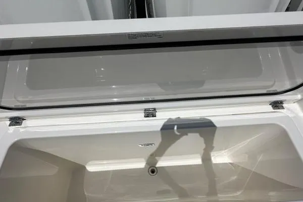 Blue Liner Yacht Photos Pics Open storage compartment of 2021 Pursuit S 428 Sport boat.
