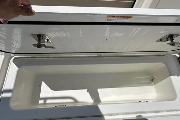 Blue Liner Yacht Photos Pics Open storage compartment on 2021 Pursuit S 428 Sport boat.