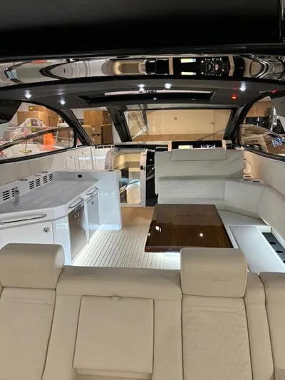  Yacht Photos Pics 2024 Cruisers Yachts 42 GLS interior with luxurious seating and modern design.