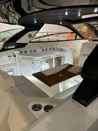  Yacht Photos Pics 2024 Cruisers Yachts 42 GLS interior with sleek seating and modern amenities.