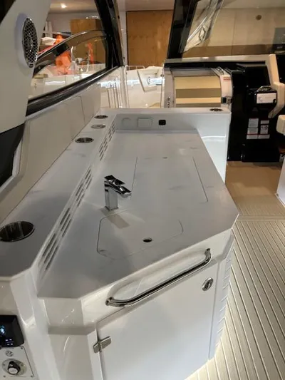  Yacht Photos Pics 2024 Cruisers Yachts 42 GLS interior with sleek kitchen and modern amenities.