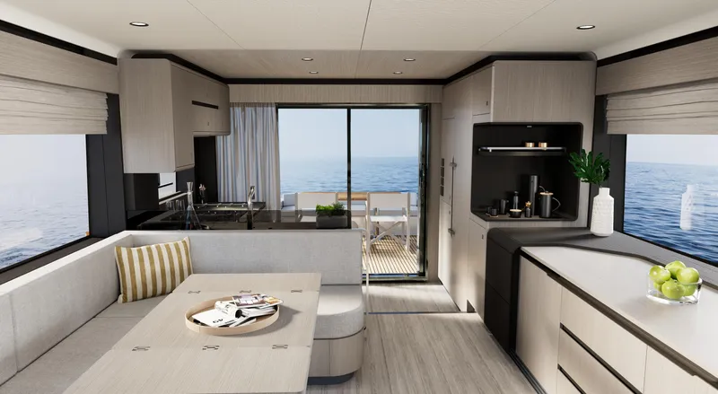  Yacht Photos Pics Modern interior of 2026 Sirena 60 yacht with ocean view, featuring sleek kitchen and dining area.