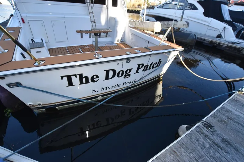 The Dog Patch Yacht Photos Pics 1990 Ocean Yachts 48 Super Sport named "The Dog Patch" docked at marina.