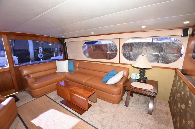 The Dog Patch Yacht Photos Pics Luxurious interior of 1990 Ocean Yachts 48 Super Sport with leather seating and elegant decor.