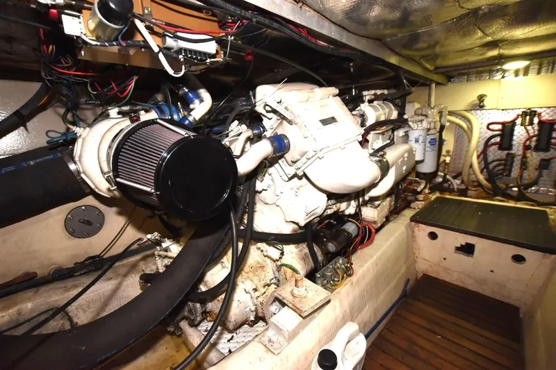 The Dog Patch Yacht Photos Pics Engine room of 1990 Ocean Yachts 48 Super Sport, showcasing detailed mechanical components.