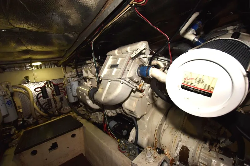 The Dog Patch Yacht Photos Pics Engine room of 1990 Ocean Yachts 48 Super Sport, showcasing mechanical components and wiring.