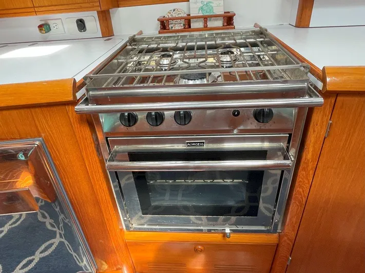 Sea Bear Yacht Photos Pics Stainless steel stove and oven in Jeanneau Sun Odyssey 45.2 yacht kitchen, 1998 model.