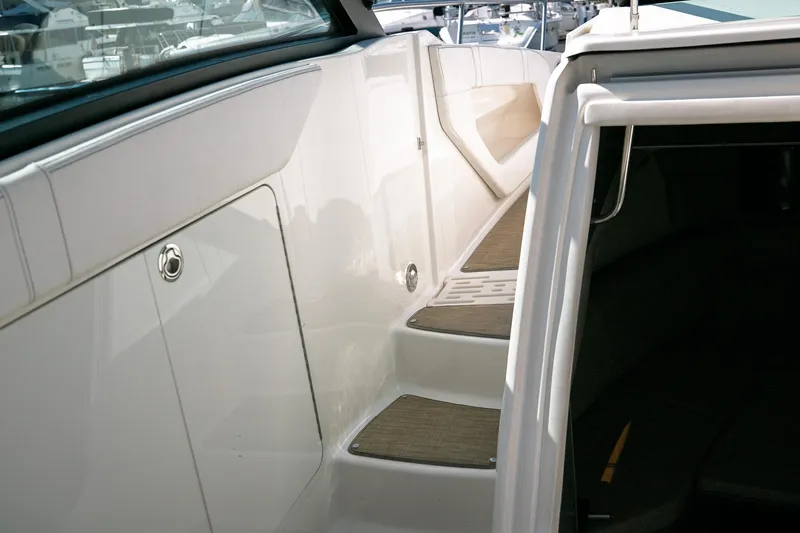  Yacht Photos Pics 2019 Sea Ray Sundancer 320 interior with sleek white steps and modern design.