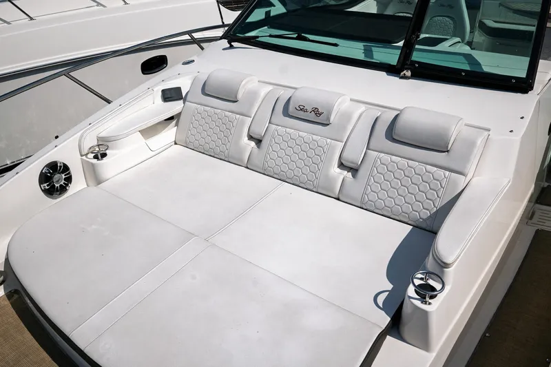  Yacht Photos Pics Luxurious seating on 2019 Sea Ray Sundancer 320 boat, featuring elegant white upholstery.