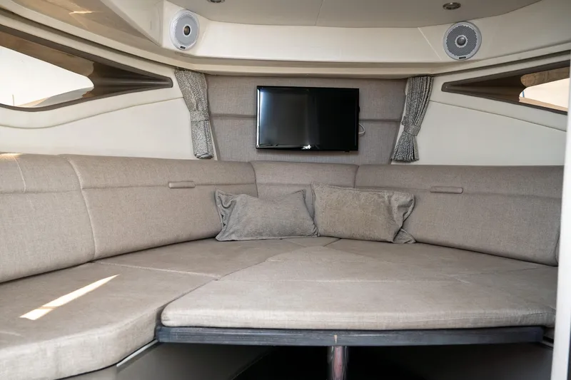  Yacht Photos Pics Interior of 2019 Sea Ray Sundancer 320 with cozy seating and mounted TV.