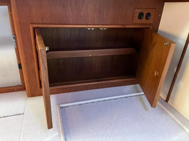Lio Kai Yacht Photos Pics Wooden cabinet interior on 1999 Grand Banks Eastbay 38 yacht.