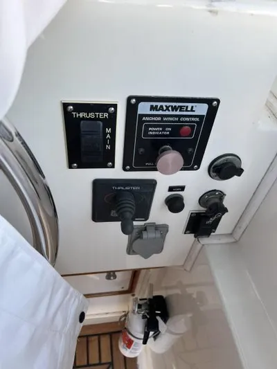 Lio Kai Yacht Photos Pics Control panel of a 1999 Grand Banks Eastbay 38 boat with thruster and anchor controls.