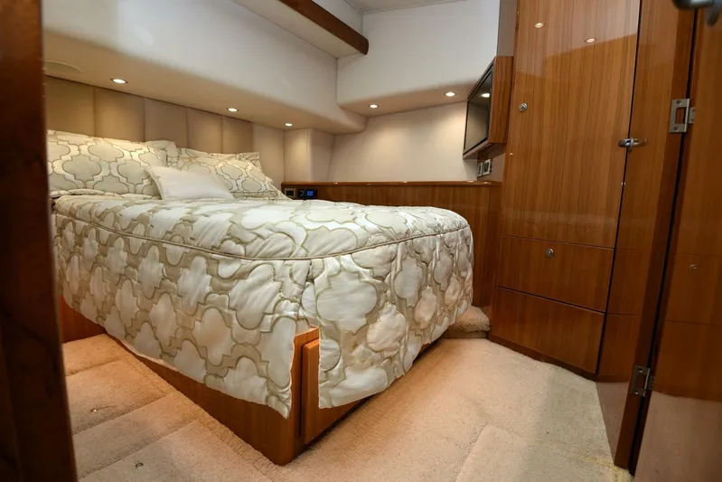 My Way Yacht Photos Pics Luxurious bedroom interior of 2019 Viking 44 Convertible yacht.