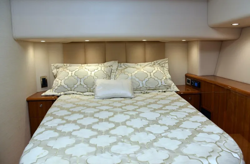 My Way Yacht Photos Pics Luxurious bedroom interior of 2019 Viking 44 Convertible yacht.