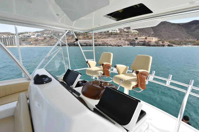 My Way Yacht Photos Pics 2019 Viking 44 Convertible yacht helm with ocean view and luxury seating.