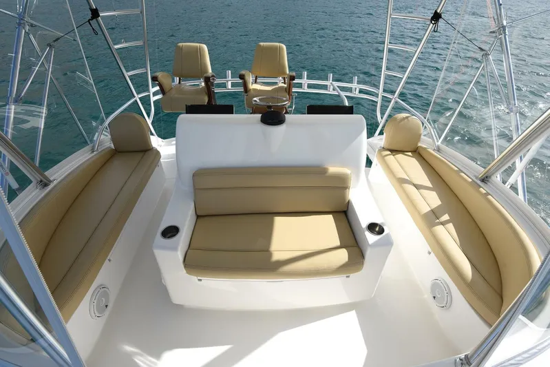 My Way Yacht Photos Pics 2019 Viking 44 Convertible yacht interior with beige seating and ocean view.