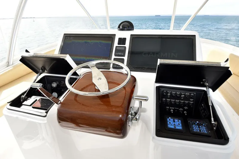 My Way Yacht Photos Pics Viking 44 Convertible 2019 helm with navigation screens and controls.