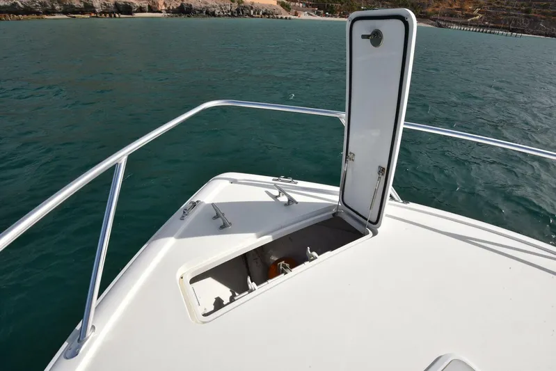 My Way Yacht Photos Pics Viking 44 Convertible 2019 boat with open hatch on deck, ocean view.